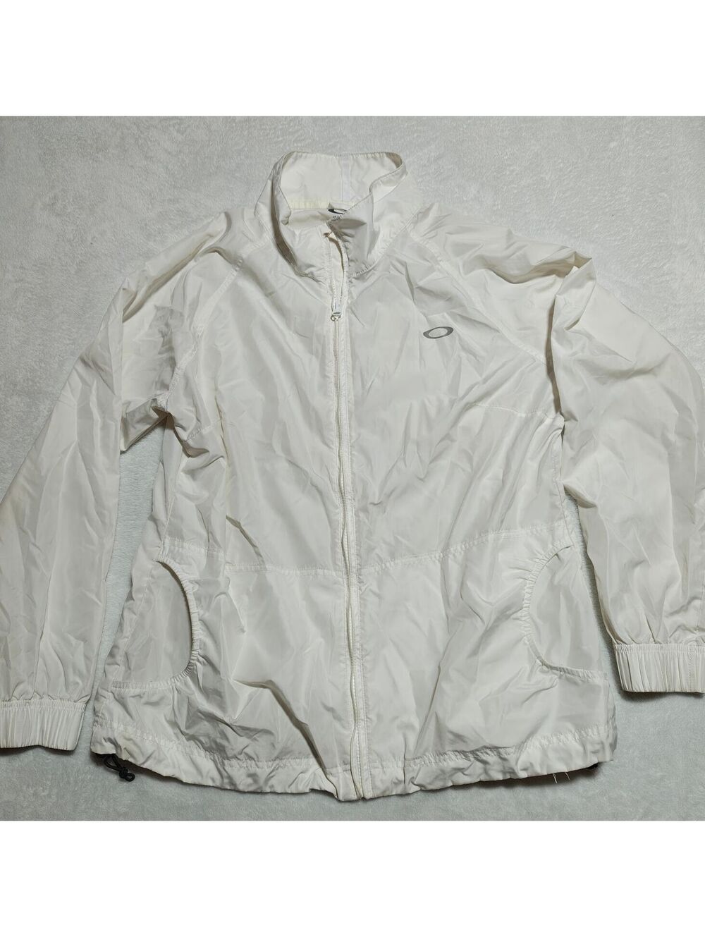 Oakley white zip up windbreaker with cinched hem